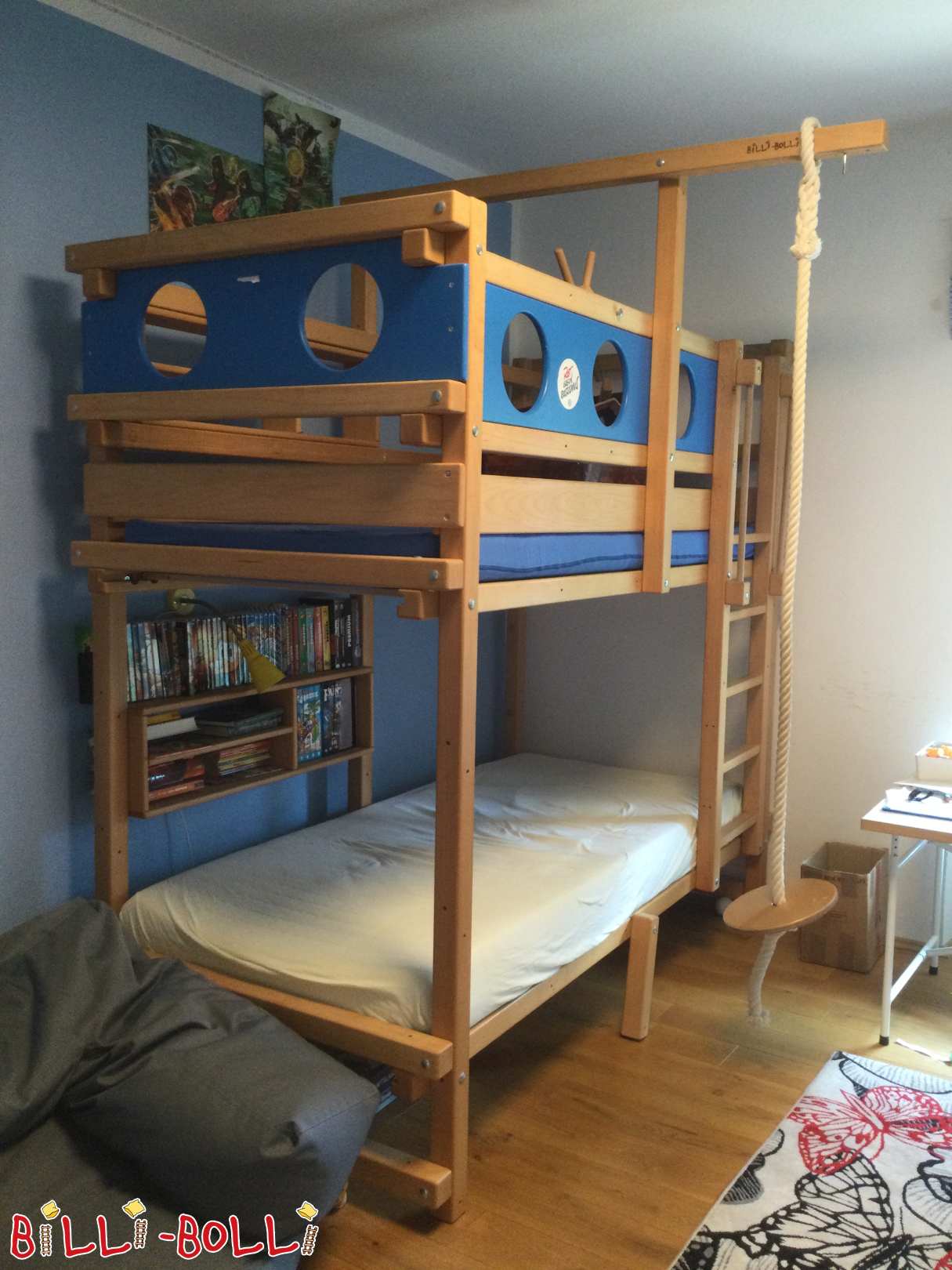 Bunk bed with bunk board, steering wheel, climbing rope, bookcase (Category: Bunk Bed pre-owned)
